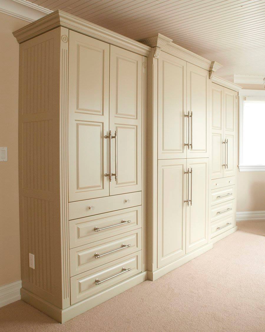 millwork, cabinetry, crown molding, wardrobe, pulls